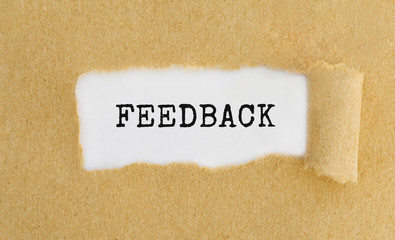 Poster - text feedback appearing behind ripped brown paper