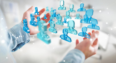 Aufkleber - Businessman holding 3D rendering group of blue people