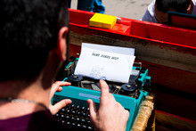 Writer Typing On Old Typewriter Uring Sant Jordi Day In Barcelona