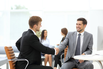 Sticker - Business meeting at the table with handshake