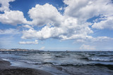 Fototapeta Niebo - Cloudy seascape with sea and soft clouds