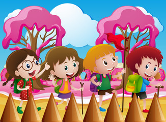 Wall Mural - Children hiking in candy world