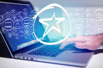 Poster - Star icon going out a laptop interface - technology concept