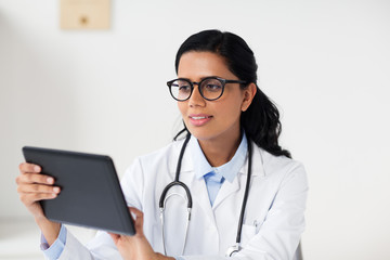 Sticker - female doctor with tablet pc at hospital