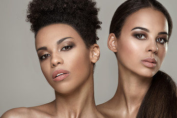 Beauty portrait of two african american girls.