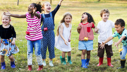 Wall Mural - Group of kindergarten kids learning gardening outdoors field trips