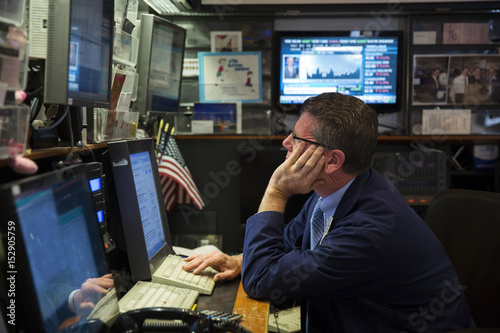 A Trader Works In The Goldman Sachs Booth On The Floor Of