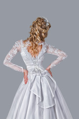 Wall Mural - Bride in wedding gown rear view