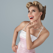 Classic Retro Style Portrait Of Young Blonde Pin-up Girl