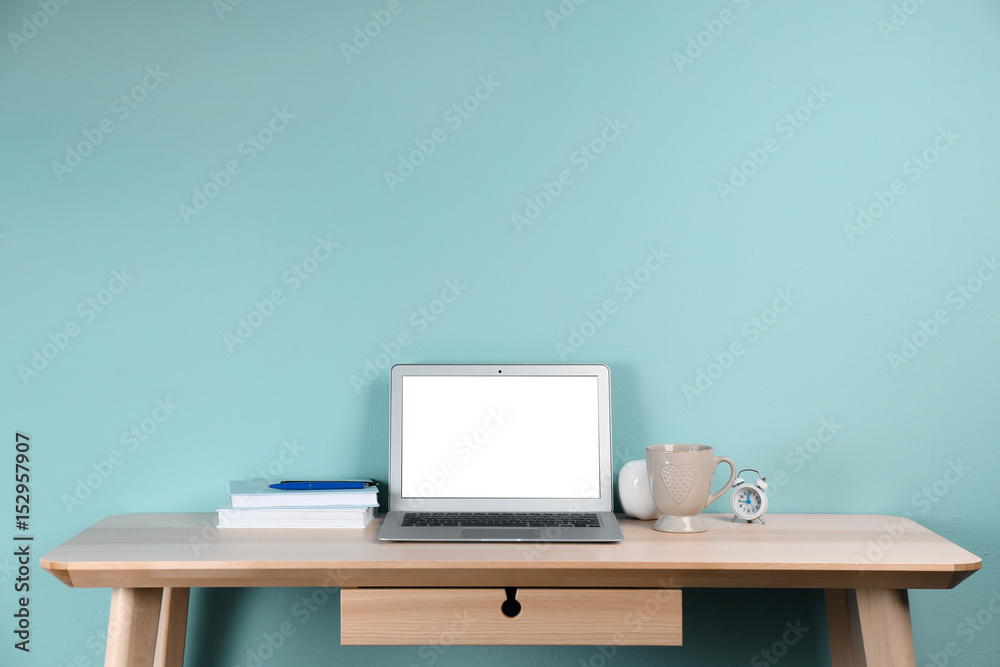 Comfortable workplace with modern laptop