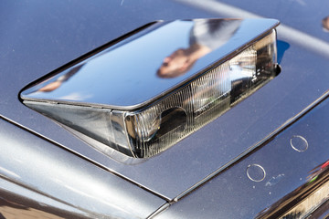 Sticker - Hood of an old retro or classic car in a car shop