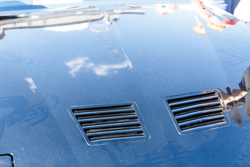 Sticker - Hood of an old retro or classic car in a car shop