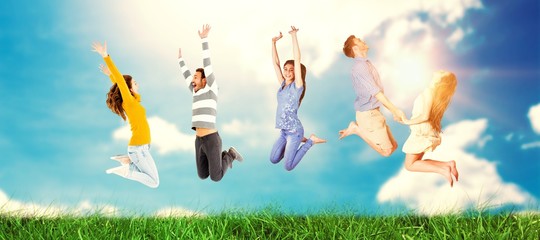 Poster - Composite image of happy friends jumping