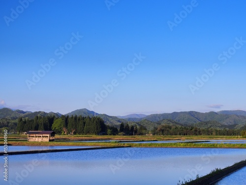 小屋のある風景 春の田植え前の田んぼ 青空 Stock Photo Adobe Stock 小屋のある風景 春の田植え前の田んぼ 青空 Stock Photo Adobe Stock