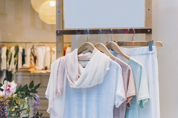 Fashionable clothes in a boutique store in Paris