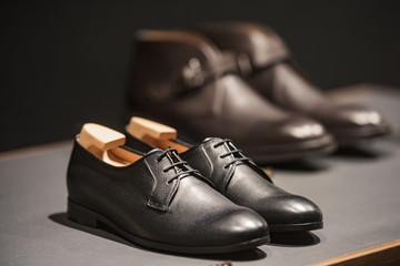 Men shoes in a luxury store in Paris.