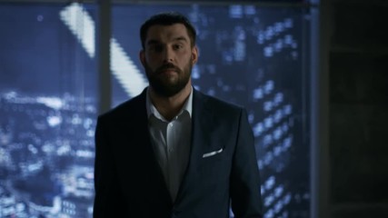Aufkleber - Late at Night Serious Businessman in a Tailored Suit Walks on Camera. In the Background Big City Window View. Shot on RED EPIC-W 8K Helium Cinema Camera.