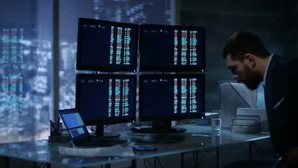 Aufkleber - Traders Takes Place at His Desk and Starts Working with Numbers Showing on Multiple Displays. Shot on RED EPIC-W 8K Helium Cinema Camera.