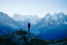 Man Looking At The Mountains Near Chamonix, France. Old Film Style.