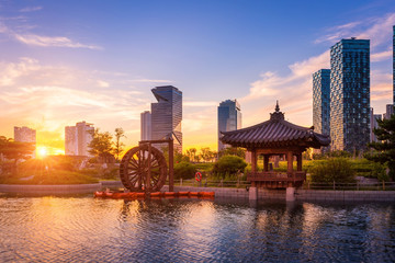 Seoul city with Beautiful sunset, traditional and modern architecture at central park in songdo International business district, Incheon South Korea.