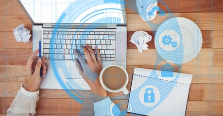 Poster - Hands using laptop by coffee on desk