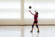 Girl playing volleyball in the sports club