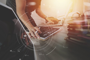 Poster - businessman working with mobile phone and digital tablet and laptop computer on wooden desk in modern office with virtual icon diagram