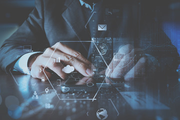 Aufkleber - businessman hand working with modern laptop computer in modern office with virtual icon diagram