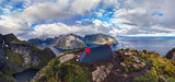Fototapeta  - Tent on top of Reinebringen, Lofoten Islands,Northern Norway.  Wild camping