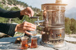 Making turkish tea from samovar outdoors