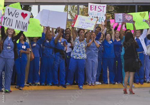 Staff Members Of Texas Health Presbyterian Hospital Gather Outside