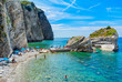 The beach near the rocky shore of the island of St. Nicholas. Budva, Montenegro.