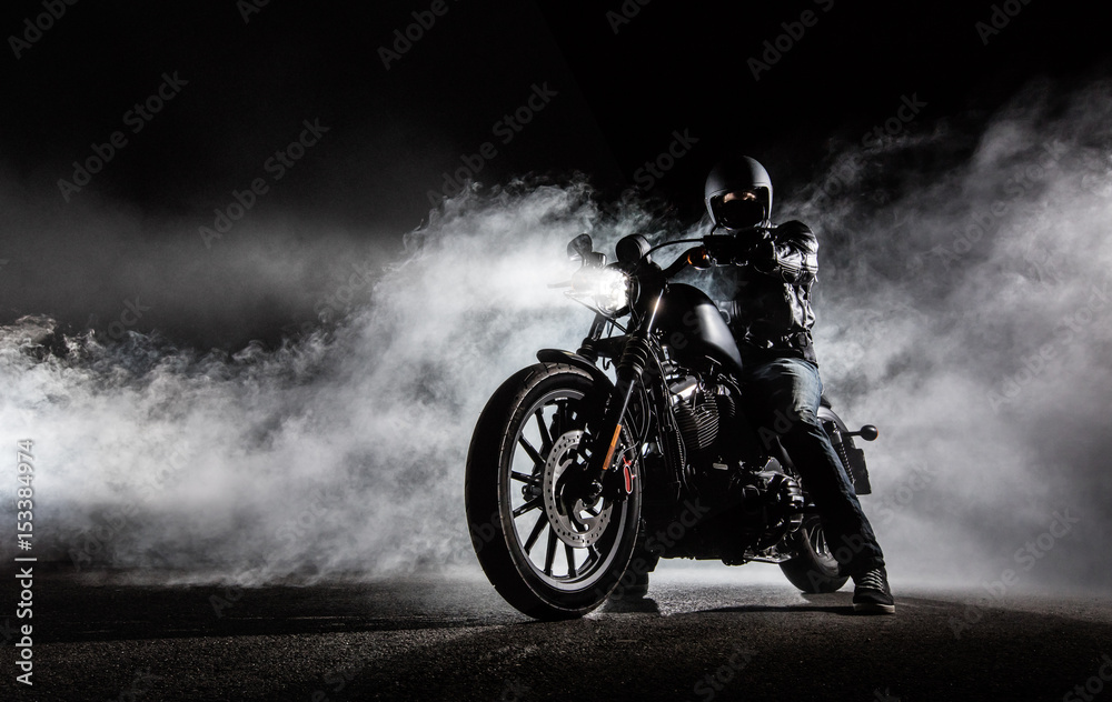 High power motorcycle chopper with man rider at night - obrazy, fototapety, plakaty 