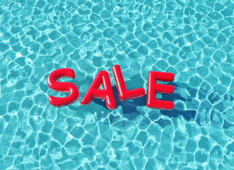 Summer sale red text floating in a swimming pool. 3D Rendering