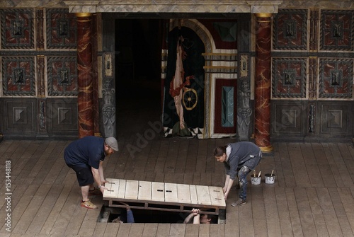 Globe Theatre Employees Install A Trap Door In The Floor Of The