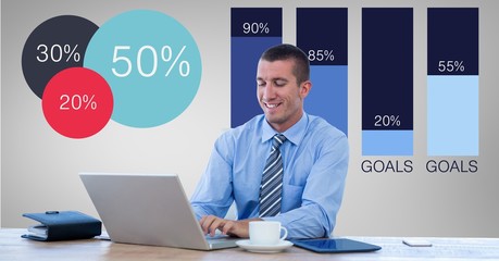 Fototapete - Smiling businessman using laptop by graphics
