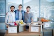 © WavebreakMediaMicro - Smiling creative business team standing
