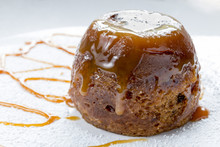 Sticky Toffee Pudding Close Up With Caramel Sauce
