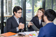 © Jestercine - Asian business people or businessman and businesswoman working, Portrait business concept, 20-30 year old.
