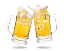 Cheers Cold Beer With Splashing Out Of Glasses On White Background.