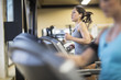 © Cavan Images - Women exercising on treadmills in health club
