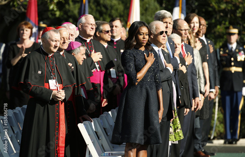 U S First Lady Michelle Obama Stands With U S Bishops And