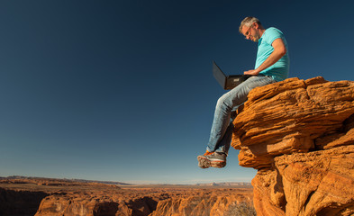 man at work in a canyon