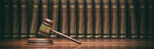 Wooden Judge Gavel And Law Books. 3d Illustration