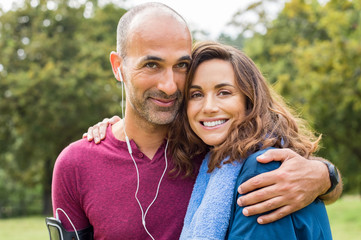 Wall Mural - Couple relaxing after jogging