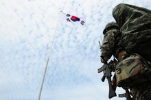 A South Korea Marine Corps Soldier Saluted The Korean National Flag