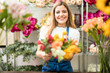 © AntonioDiaz - Happy florist showing her work