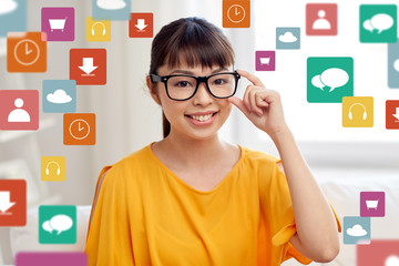 Poster - happy asian young woman in glasses at home