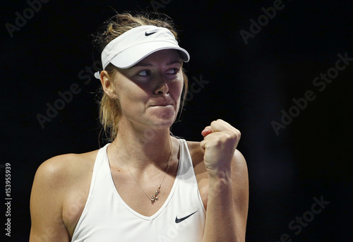 Maria Sharapova Of Russia Celebrates A Point Against Agnieszka
