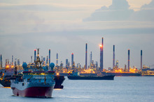 Survey And Cargo Ships Off The Coast Of Singapore Petroleum Refinery